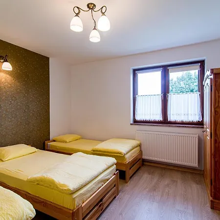 Bursztynowy Dworek Séjour chez l'habitant *