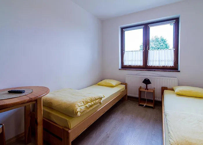 Bursztynowy Dworek Rum i privatbostad Łeba