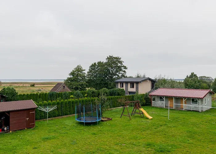 Bursztynowy Dworek Rum i privatbostad Łeba