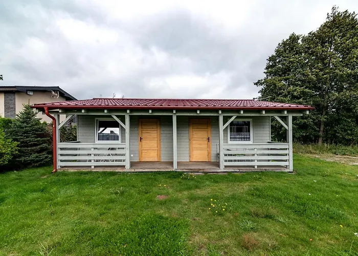 Bursztynowy Dworek Rum i privatbostad Łeba