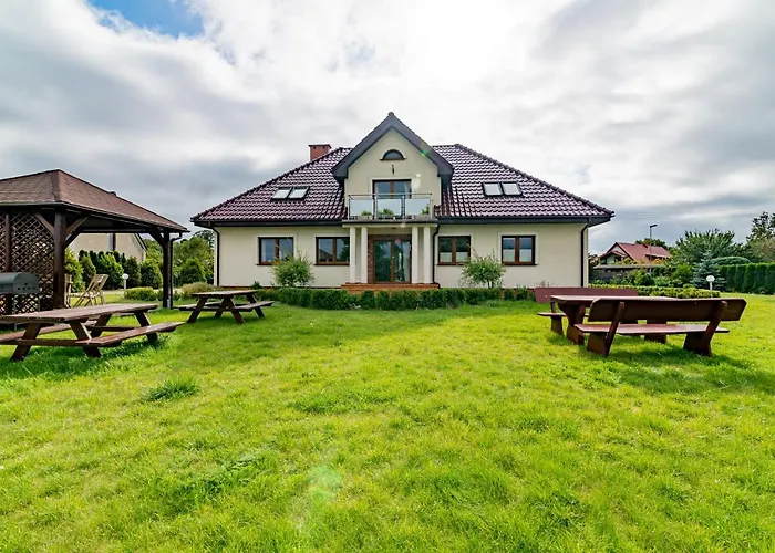 Bursztynowy Dworek Rum i privatbostad Łeba