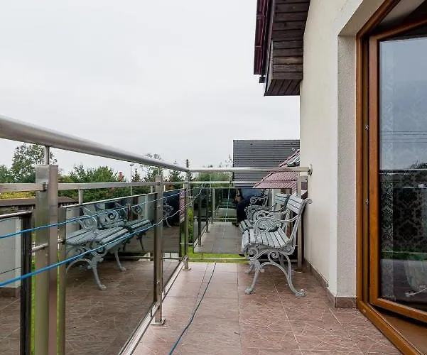 Bursztynowy Dworek Rum i privatbostad Łeba