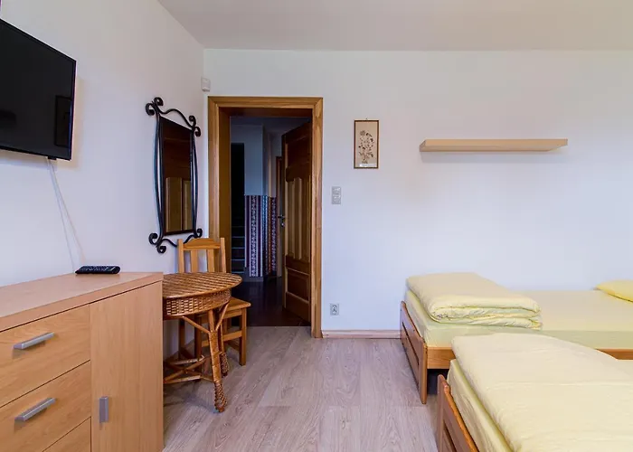 Bursztynowy Dworek Rum i privatbostad Łeba