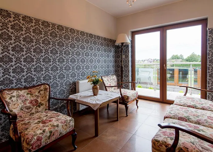 Bursztynowy Dworek Rum i privatbostad Łeba