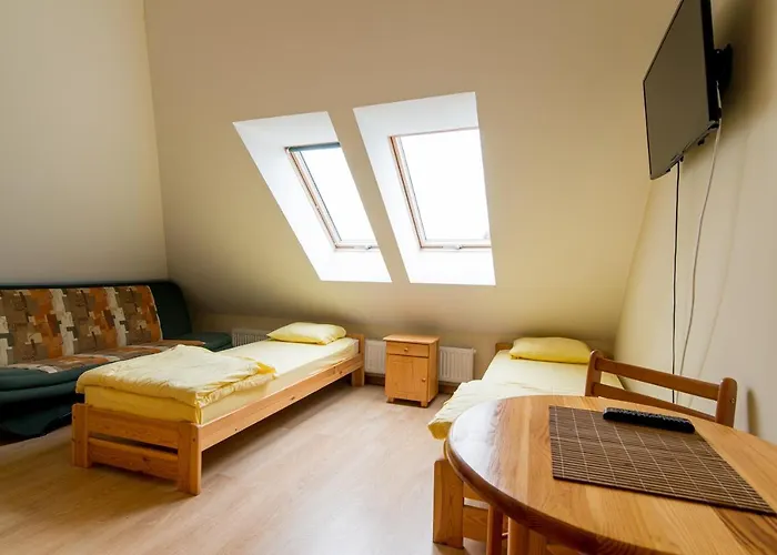 Bursztynowy Dworek Rum i privatbostad Łeba